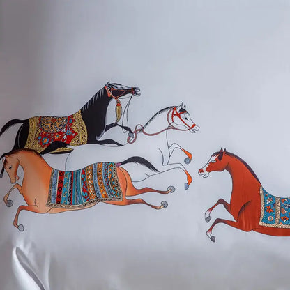 Embroidered white bedding set featuring a vibrant hand-painted decorbites galloping horse illustration on fabric
