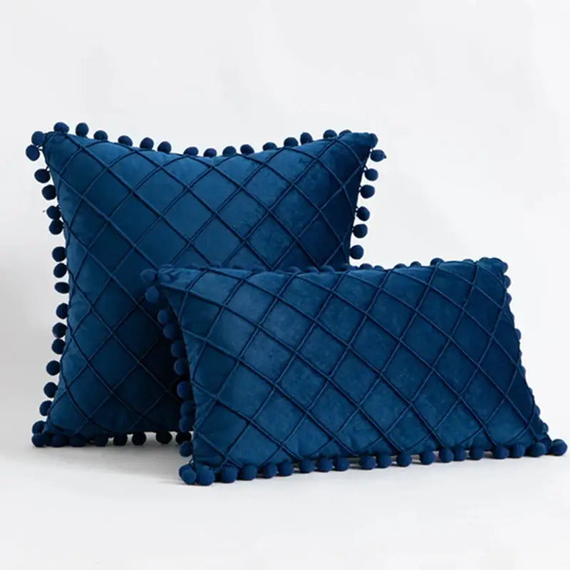 Deep blue velvet pillows with diamond quilted pattern and pompom trim for decorbites corduroy striped living room decor