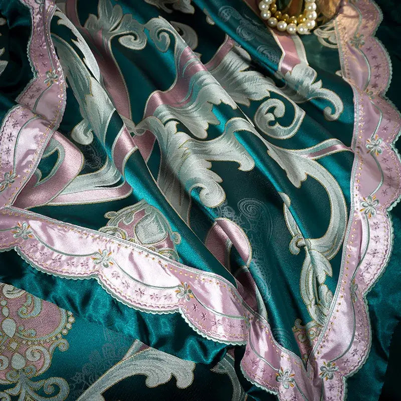Emerald green satin bedding set with intricate silver and pink embroidered baroque patterns and scalloped lace trim made of 200s embroidery egyptian cotton