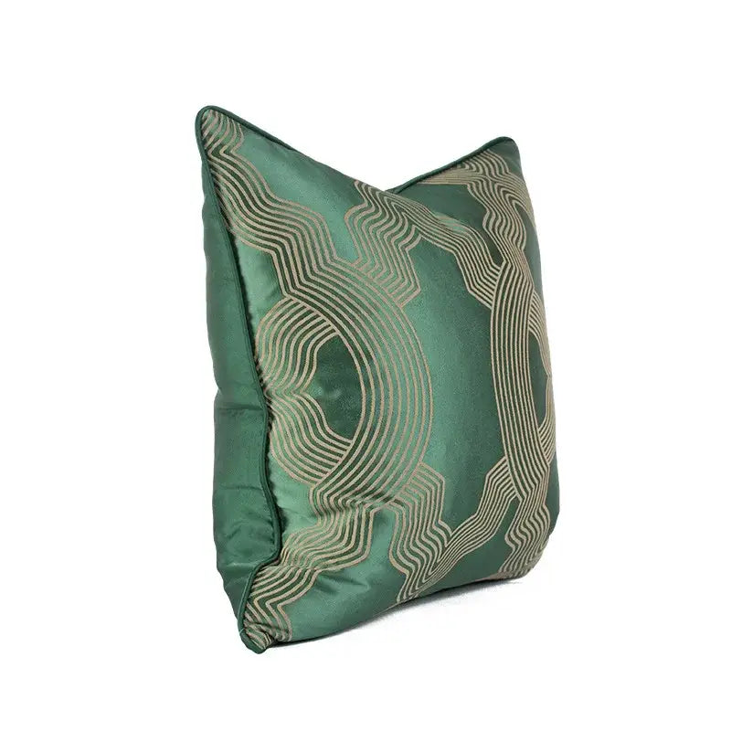 Emerald green geo jacquard cushion cover with intricate gold-toned geometric embroidery in satin fabric for living room