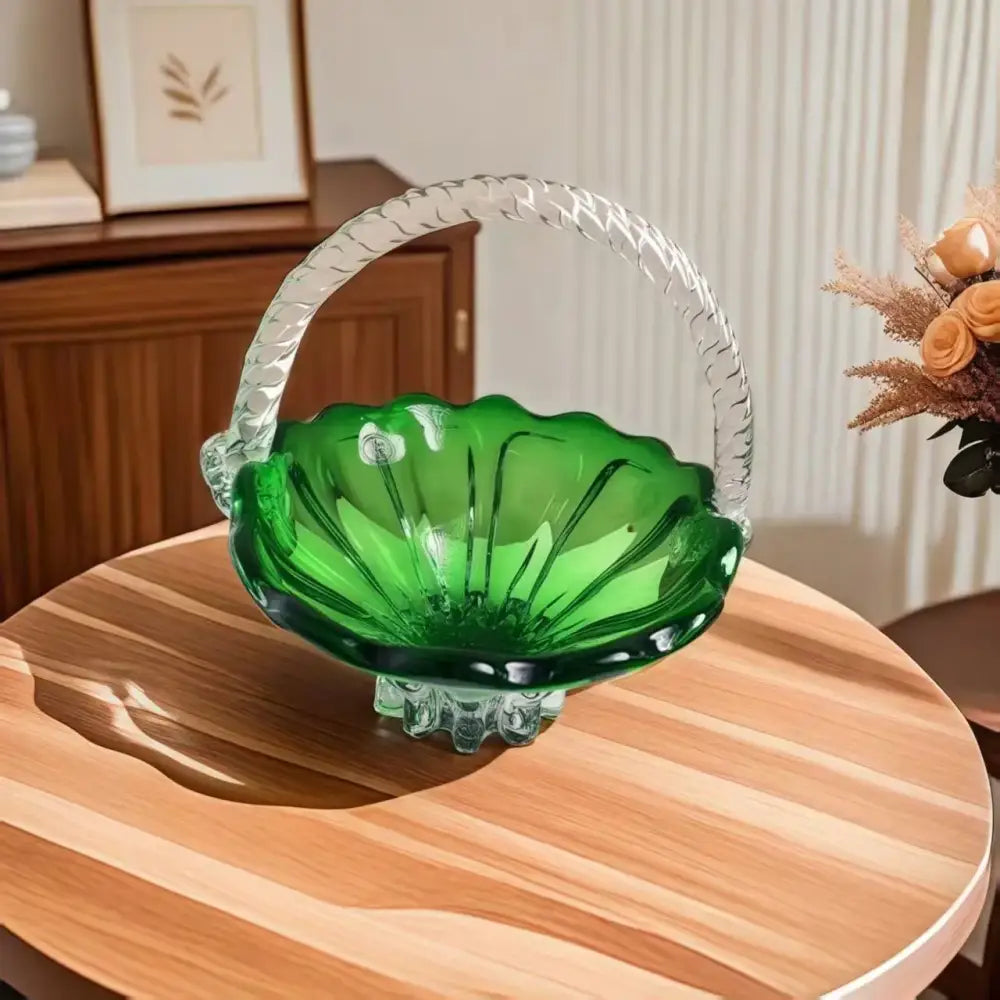 Emerald green glass fruit basket with scalloped edges and decorbites crystal handle for living room tray use
