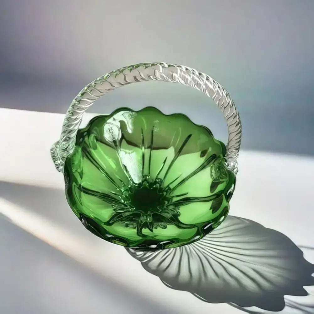 Emerald green glass fruit basket with intricate petal ridges and decorbites crystal handle for living room tray