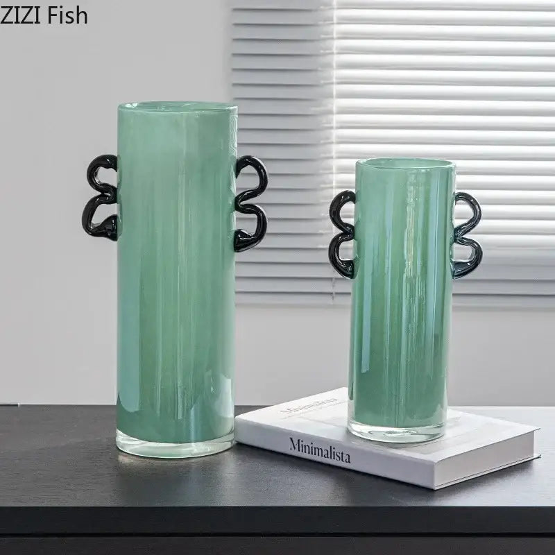 Two emerald green glass vases with black twisted handles perfect as living room decor green glass vase