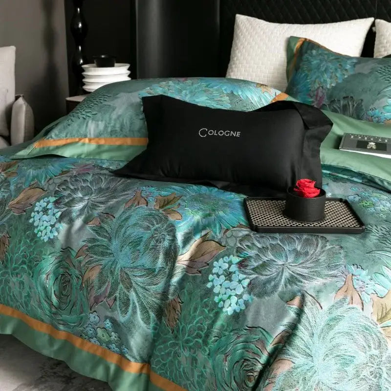 Teal and gold floral satin bedding set with a black cologne pillow in emerald green and gold egyptian cotton bed linens