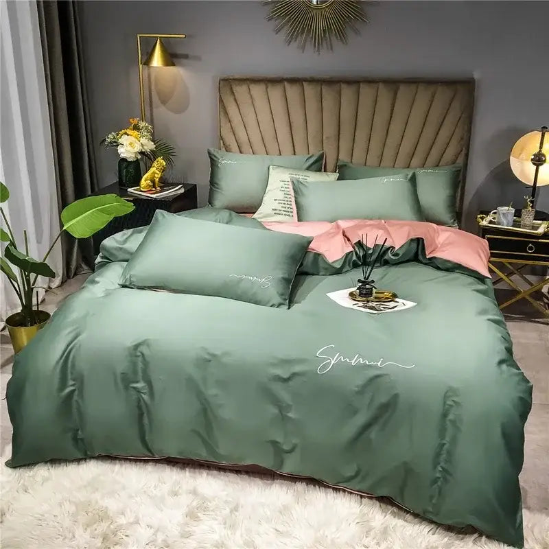 Emerald green satin duvet cover set with white cursive script design in egyptian cotton bedding set for bedroom use
