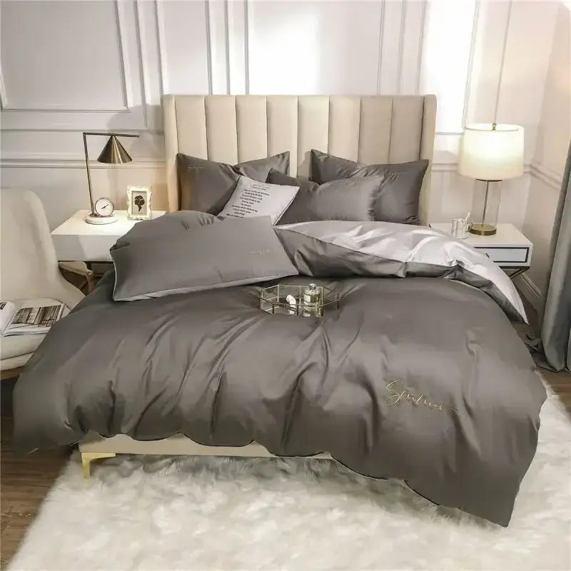 Emerald green and pink egyptian cotton bedding set with gray satin duvet cover featuring subtle gold embroidery on front