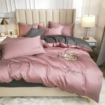 Emerald green and pink egyptian cotton bedding set featuring a pink satin duvet cover with dark gray accent and embroidery