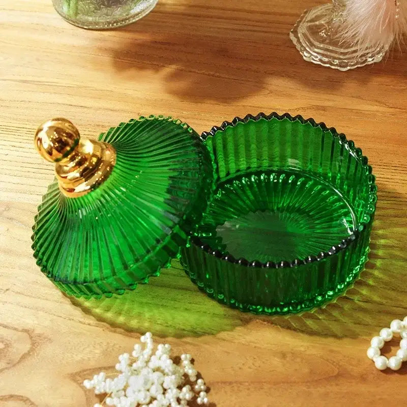 Emerald green striped glass storage jar with ribbed fluted design and gold-toned knob lid for decorbites green striped decor
