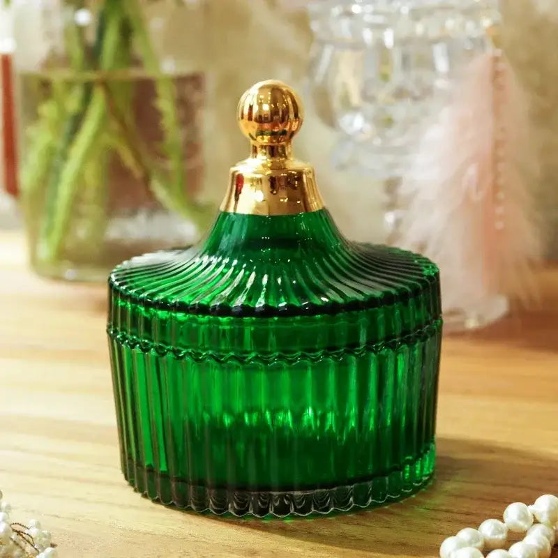 Emerald green striped ribbed glass storage jar with gold-toned lid for decorbites bedroom jewelry storage