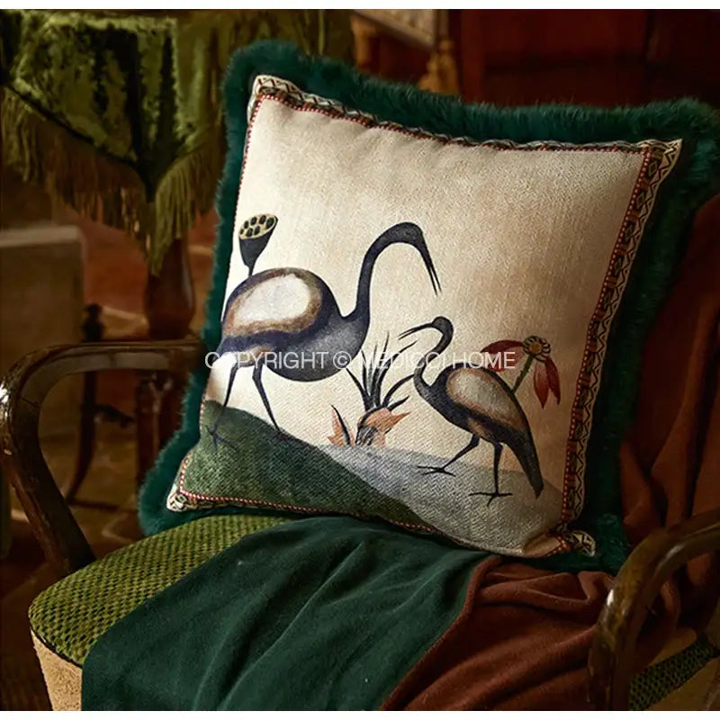 Emerald green velvet cushion cover with beige embroidered birds floral print and dark green fringed edges for decorbites birds floral decor