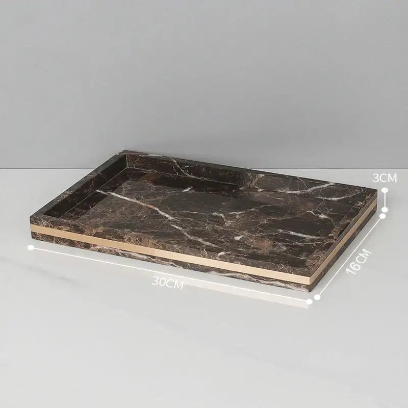 Rectangular emperador dark marble tray in brown with gold-toned metallic trim for dark marble bathroom set