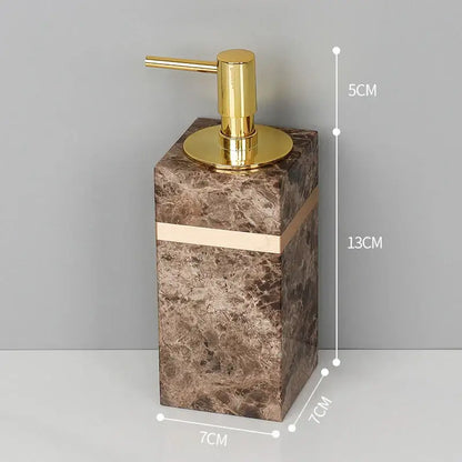 Brown marble soap dispenser with gold-tone pump and accent band from emperador dark marble bathroom set
