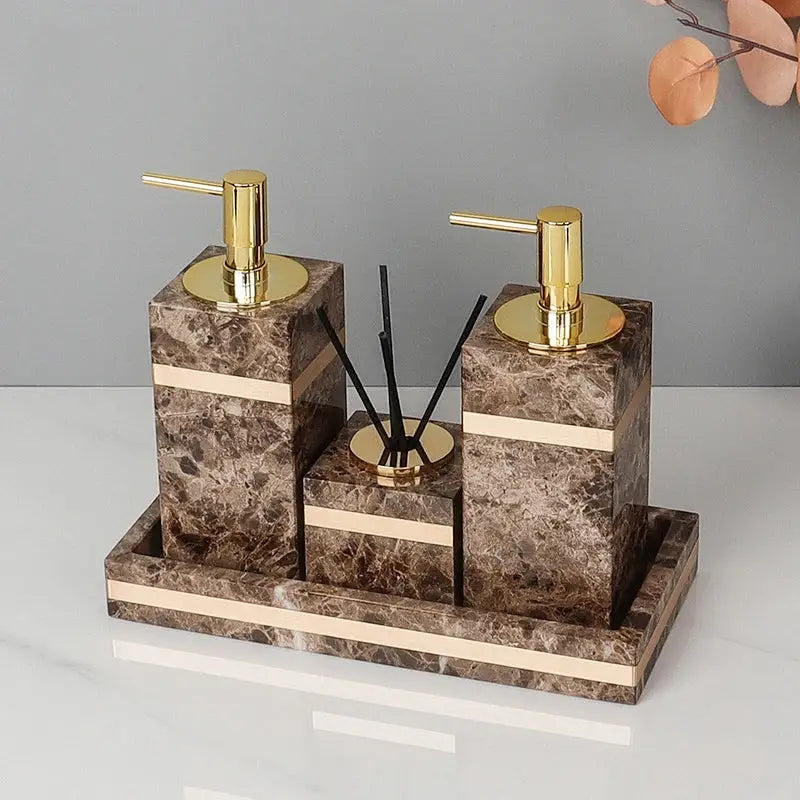 Emperador dark marble bathroom set featuring brown marble with gold-tone pump dispensers and matching tray accessories