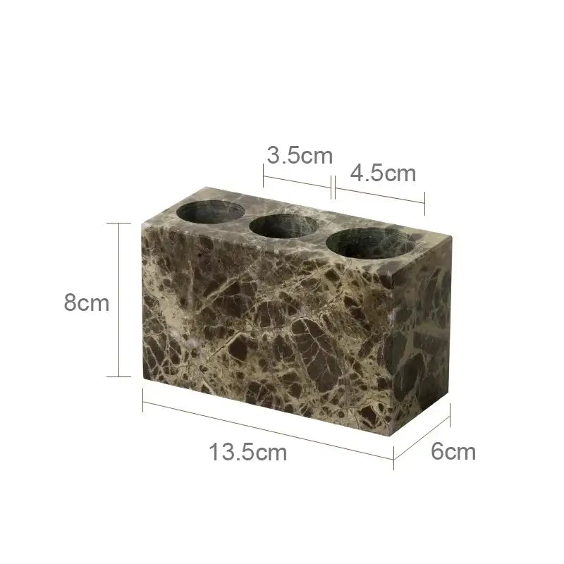 Brown and beige marbled stone toothbrush holder with three openings from emperador dark marble bathroom set with chrome accents