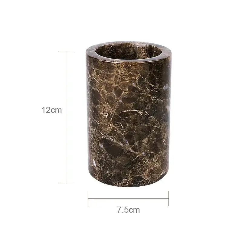 A cylindrical emperador dark marble toothbrush holder with polished veined surface 12cm tall and 7.5cm diameter