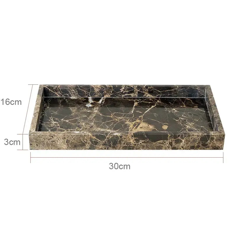 Rectangular black and gold emperador dark marble tray with glossy finish from dark marble bathroom set with chrome accents