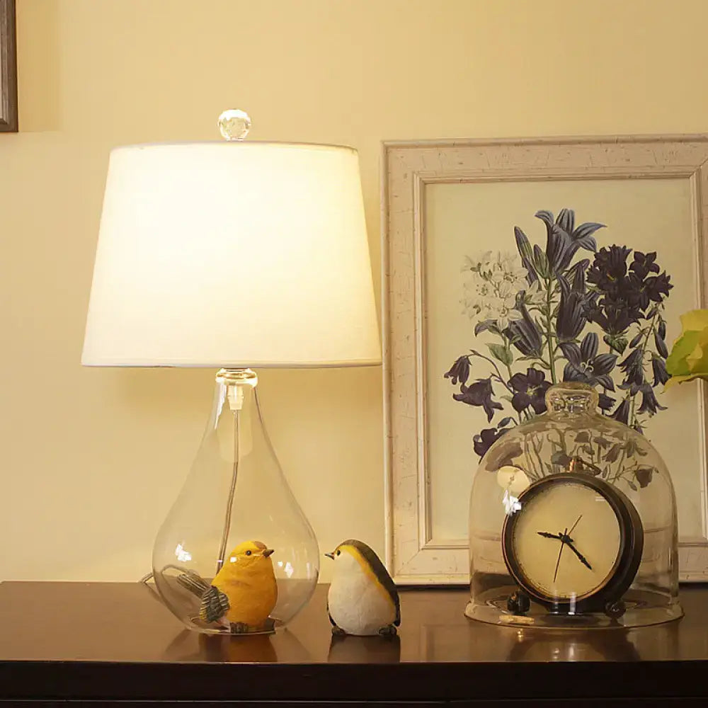 DecorBites Nordic Empire shade table lamp with clear glass base white fabric shade and crystal finial for living room