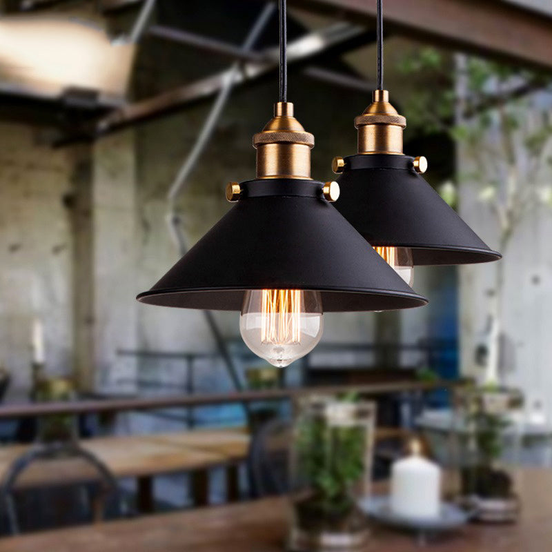 Engineering chandelier featuring a black and gold cone-shaped iron shade inspired by american countryside iron chandelier designs
