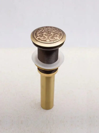 Engraved brass bathroom sink pop up drain stopper with ornate dragon and floral design for brass bathroom sink decorbites