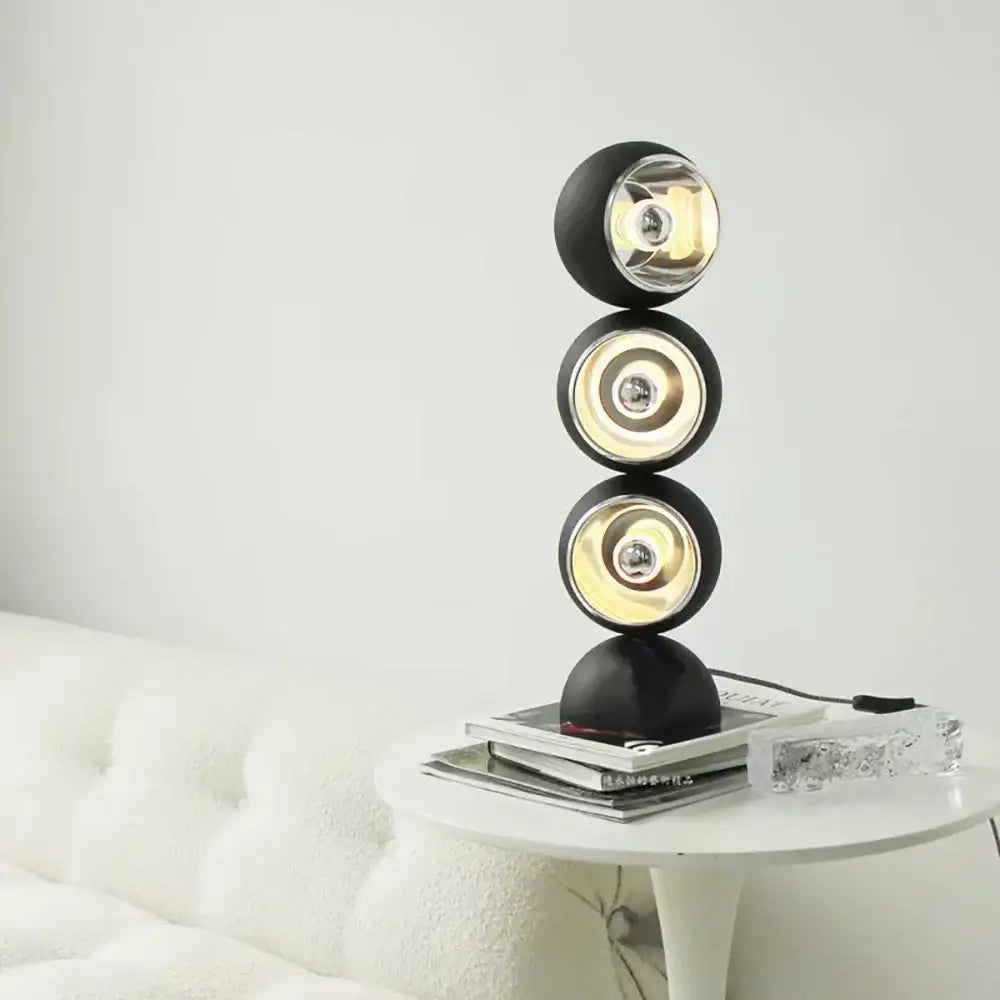 Black spherical table lamp with three stacked circular dimmable led nordic fixtures featuring gold interiors for bedroom decorbites dimmable led