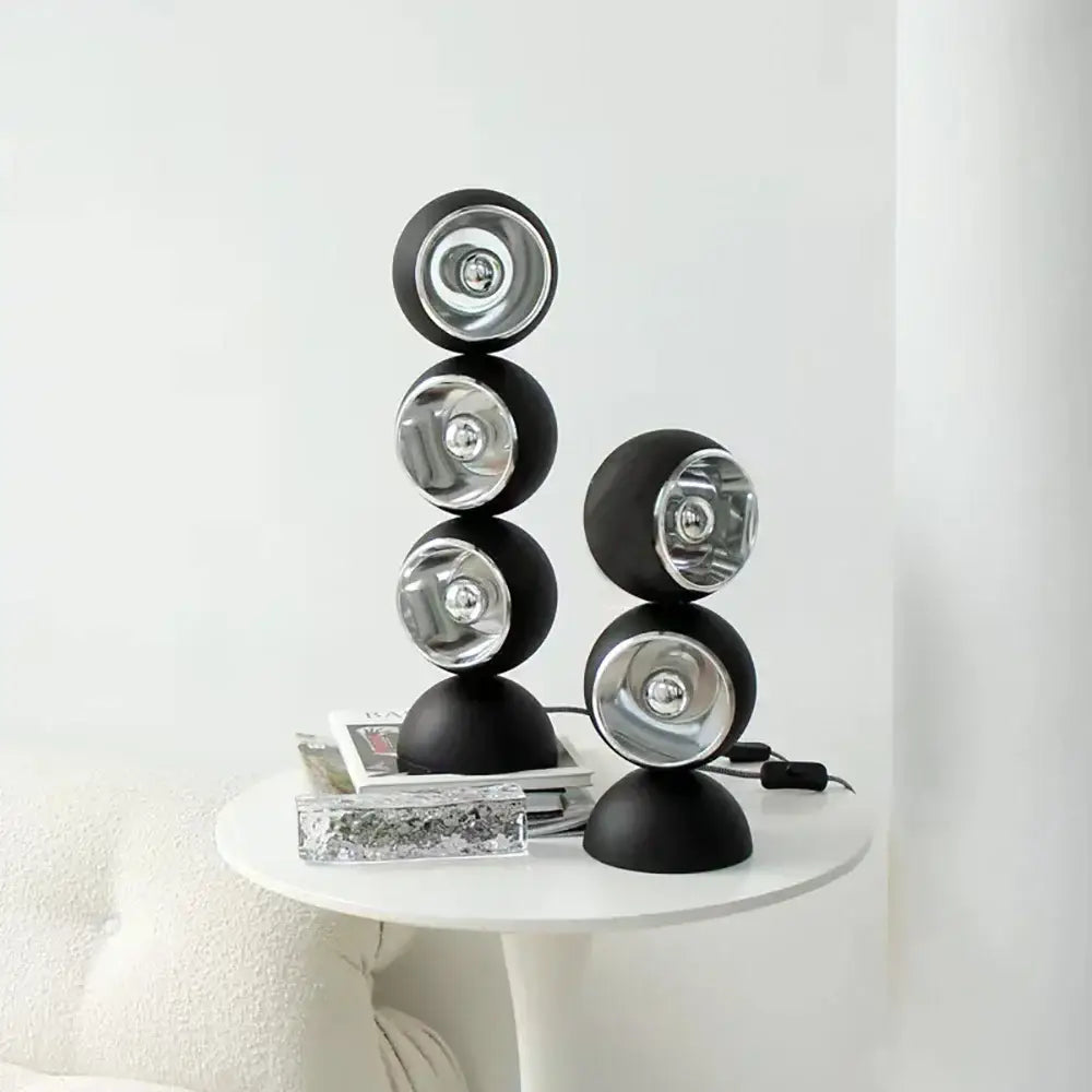 Black spherical engraved chrome yoyo dimmable led nordic table lamp with reflective silver interiors stacked in modern decorbites design