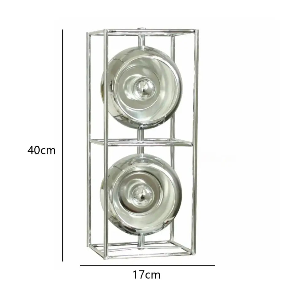 A sleek chrome-framed decorative shelf with two reflective glass bowls complements the dimmable led nordic table lamp