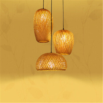 Rattan pendant light with woven design and warm yellow glow.