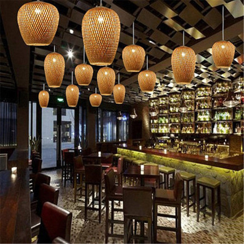 Rattan pendant light fixture with woven texture and natural brown color.