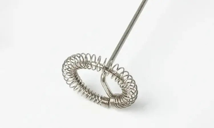 Silver metal mini mixer frother with coiled spring design and long handle for ergonomic electric mini mixer use