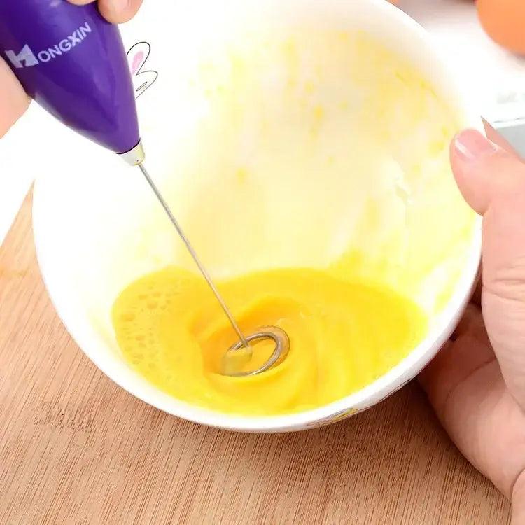 Purple hongxin electric mini mixer with metallic whisk tip blending yellow liquid in white bowl for kitchen use