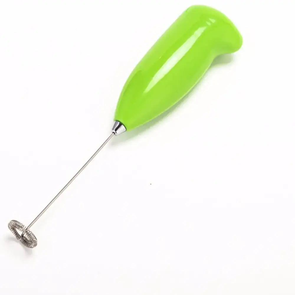 Ergonomic brown electric mini mixer frother with bright lime green plastic handle and stainless steel whisk attachment