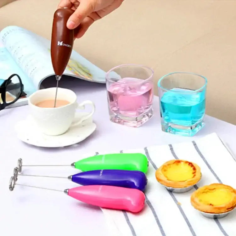 Ergonomic brown electric mini mixer frother with sleek design and metallic tip for kitchen coffee stirring