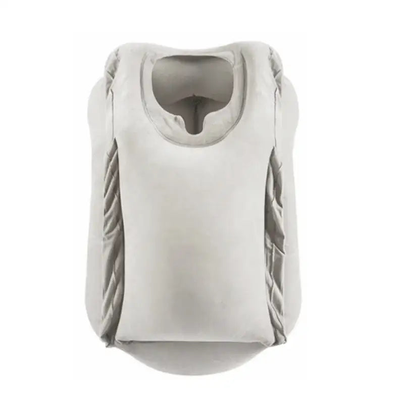 Ergonomic gray inflatable travel pillow with soft light gray plush cover and quilted side panels for neck support