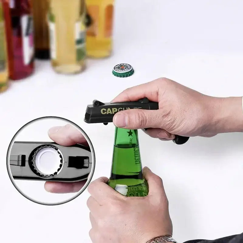 Black plastic ergonomic bottle opener gun with capgun branding and built-in compass for kitchen bar use