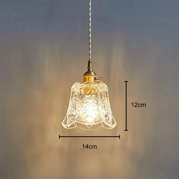 Delicate 12cm tall glass pendant light with etched bell-shaped shade and polished copper brass hardware for dining room