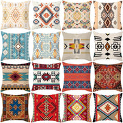 A collection of decorbites ethnic bohemian pillow covers with intricate colorful geometric patterns in earthy tones for living room decor
