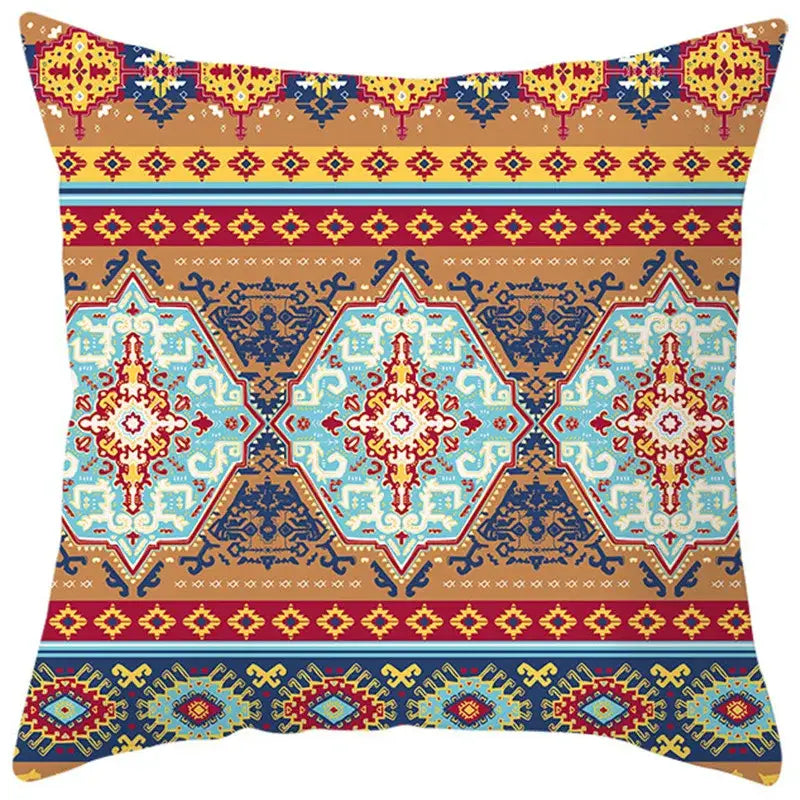 Vibrant ethnic bohemian geometric pillow cover with intricate tribal designs in blue red yellow and brown for living room decor
