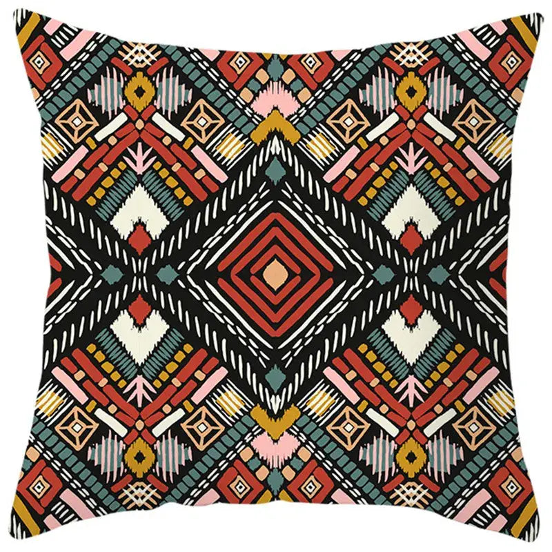 Ethnic bohemian geometric pillow cover with vibrant red teal cream patterns on black for living room decorbites decor