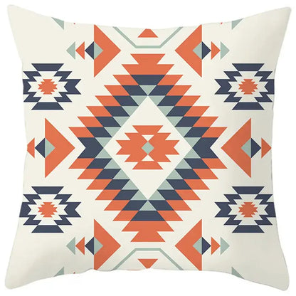 Cream-colored pillow cover with bold orange navy blue and gray ethnic bohemian geometric pattern for living room decor