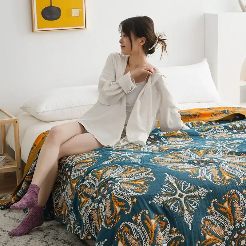 Teal and gold paisley ethnic cotton blanket by decorbites featuring mustard and navy colors for bedroom decor