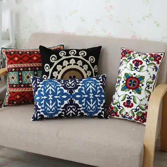 Four decorative pillow cases with ethnic floral canvas cotton embroidery in vibrant colors for living room decorbites decor