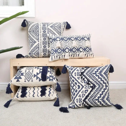 Set of four ethnic geometric printed navy and white cushion cover throw pillows with tassels for living room decorbites decor