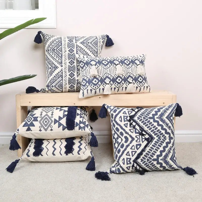 Set of four ethnic geometric printed navy and white cushion cover throw pillows with tassels for living room decorbites decor