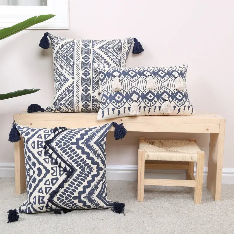 Three navy and white ethnic geometric printed cushion covers with tassels for living room decorbites cushion cover decor