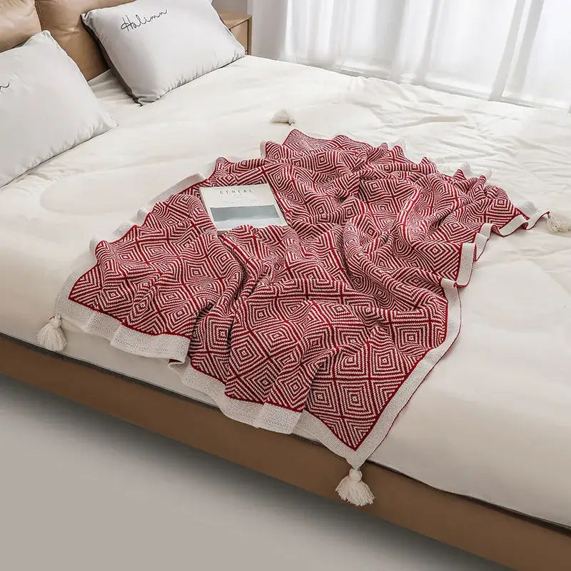 Ethnic geometry knitted red and white geometric-patterned throw blanket with tassel trim for living room sofa decorbites