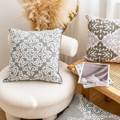 Gray cushion cover with intricate white embroidered decorbites ethnic pattern for living room decor