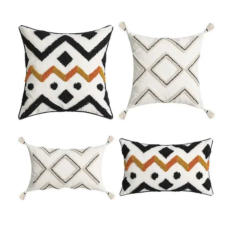 Set of four decorbites ethnic style black and orange geometric cushion cover throw pillows with tassels