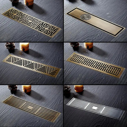 Brass rectangular floor drain with intricate geometric and floral patterns for bathroom shower use decorbites euro antique brass