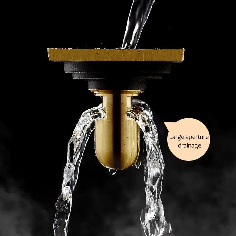 Gold-colored euro antique brass floor drain with sleek cylindrical body and square top plate for bathroom shower waste