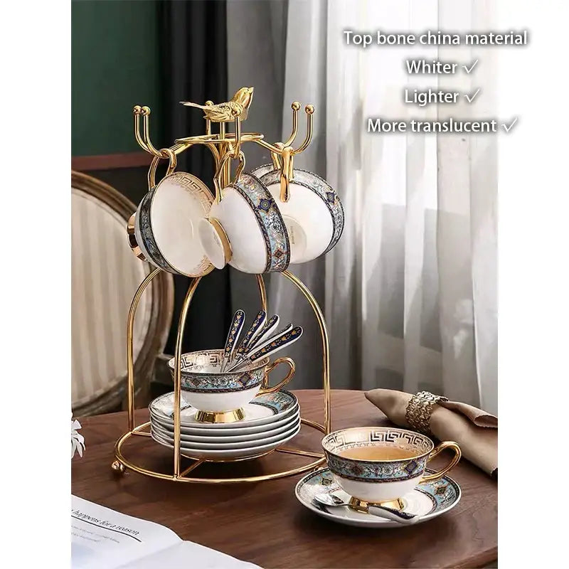 Elegant european blue and gold bone china tea set with intricate geometric patterns on a golden metal stand by decorbites bone china